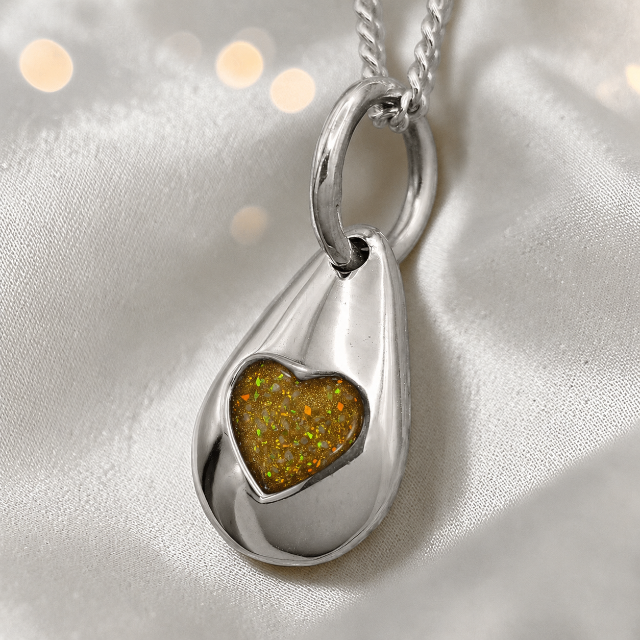 Gacrux pebble shaped pendant with heart memorial stone in gold olive, handcrafted in Lancashire UK - by Keepsake Memorial Jewellery