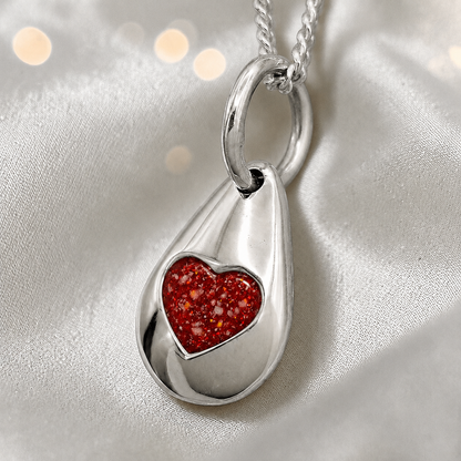 Gacrux pebble shaped pendant with heart memorial stone in ruby red, handcrafted in Lancashire UK - by Keepsake Memorial Jewellery