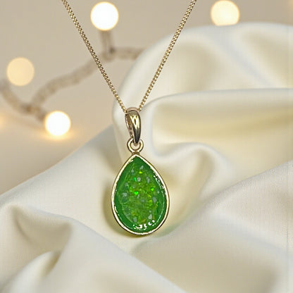 Golden Whisper 9ct gold pear drop memorial ashes pendant in fruit green, handcrafted in Lancashire UK - by Keepsake Memorial Jewellery