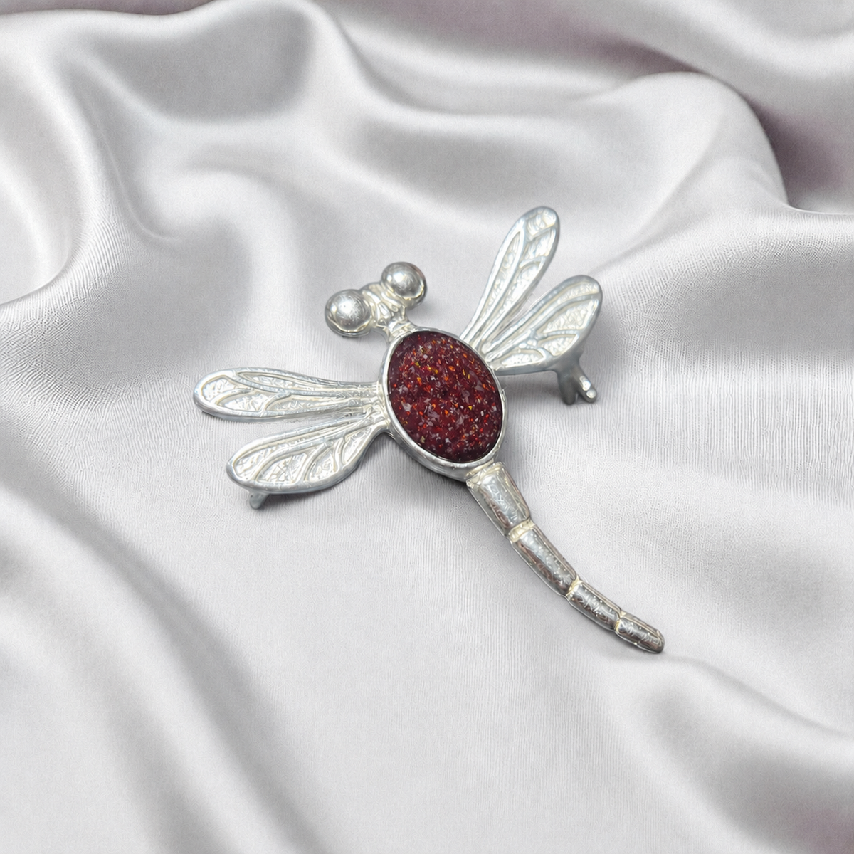 Keepsake Memorial Silver guiding light dragonfly brooch in Ruby Red. Handcrafted in the UK - by Keepsake Memorial Jewellery