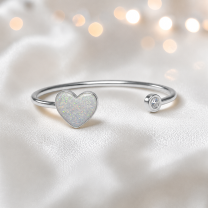 Halcyon Bangle — silver heart ashes memorial bangle in white snow, handcrafted in Lancashire, UK - by Keepsake memorial Jewellery