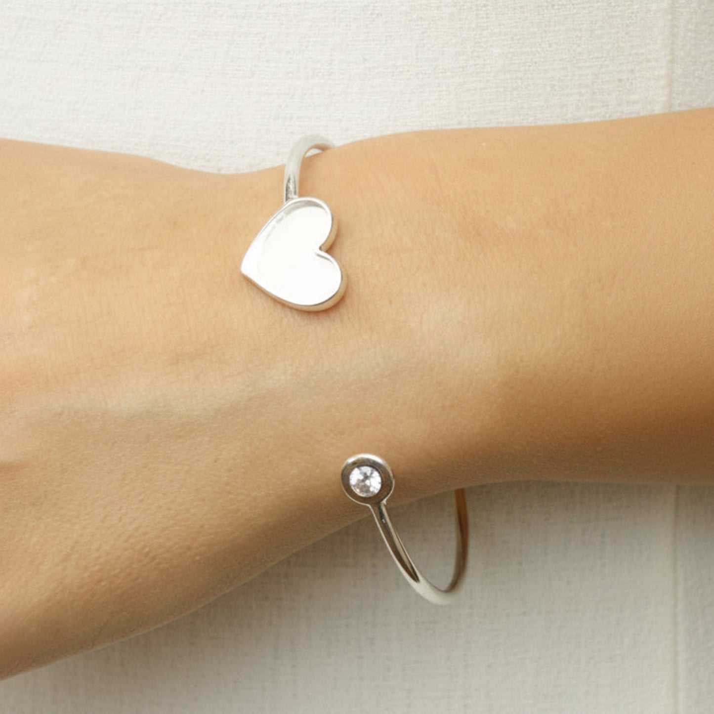 Halcyon Bangle — silver heart ashes memorial bangle, worn on wrist, handcrafted in Lancashire, UK