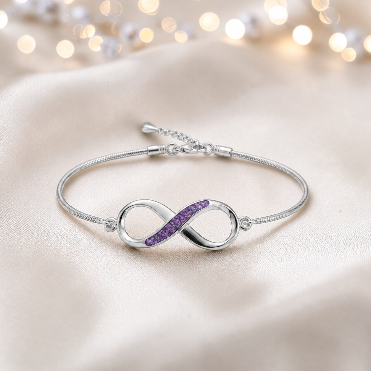 Infinity Bracelet — silver infinity ashes memorial bracelet, in rose pink, handcrafted in Lancashire, UK - by Keepsake Memorial Jewellery