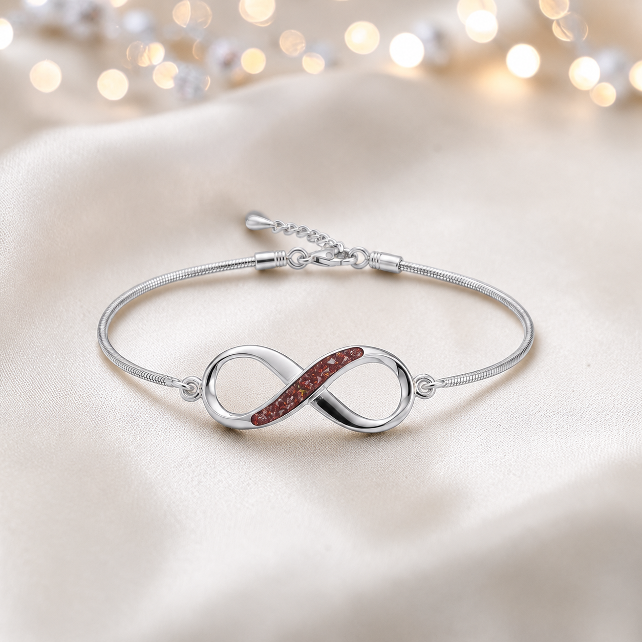 Infinity Bracelet — silver infinity ashes memorial bracelet, in ruby red, handcrafted in Lancashire, UK - by Keepsake Memorial Jewellery