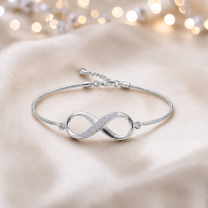 Infinity Bracelet — silver infinity ashes memorial bracelet, in unicorn purple, handcrafted in Lancashire, UK - by Keepsake Memorial Jewellery