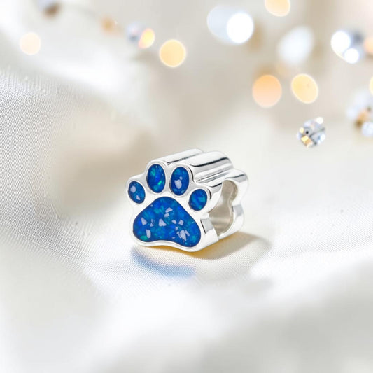Lily paw silver ashes charm, in royal blue, handcrafted in Lancashire UK - by Keepsake Memorial Jewellery 