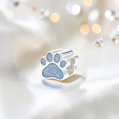Lily paw silver ashes charm, in baby blue, handcrafted in Lancashire UK - by Keepsake Memorial Jewellery 