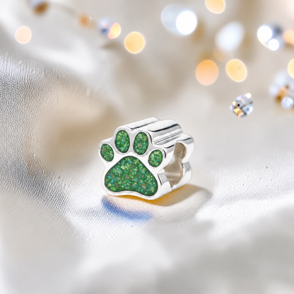 Lily paw silver ashes charm, in fruit green, handcrafted in Lancashire UK - by Keepsake Memorial Jewellery 