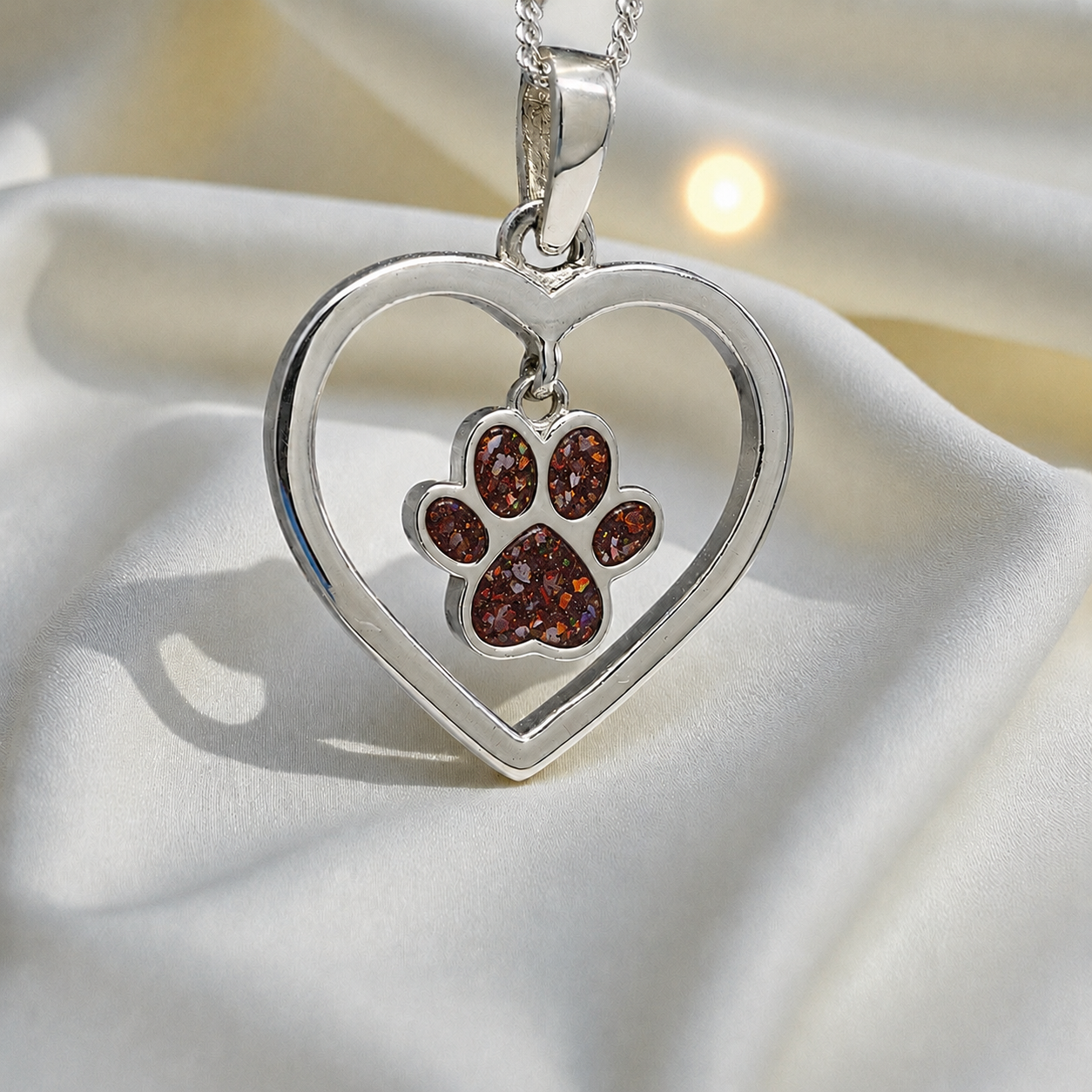 Lily pendant - heart shaped memorial ashes pendant with central paw charm in copper mocha, handcrafted in Lancashire UK - by Keepsake Memorial Jewellery
