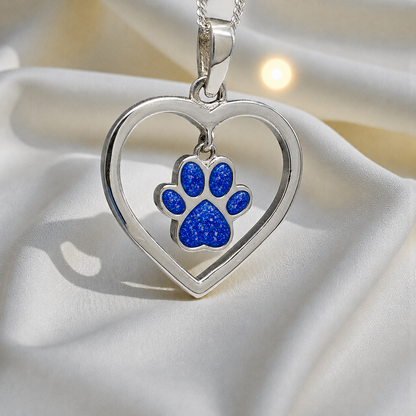Lily pendant - heart shaped memorial ashes pendant with central paw charm in royal blue, handcrafted in Lancashire UK - by Keepsake Memorial Jewellery