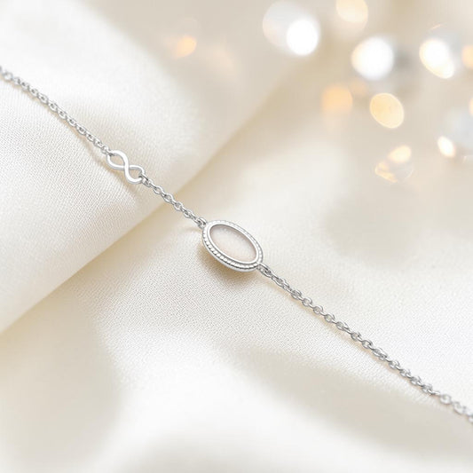 Lumen Bracelet — silver oval infinity ashes memorial bracelet, handcrafted in Lancashire, UK - by Keepsake Memorial Jewellery