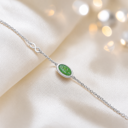 Lumen Bracelet — silver oval infinity ashes memorial bracelet in fruit green, handcrafted in Lancashire, UK - by Keepsake Memorial Jewellery