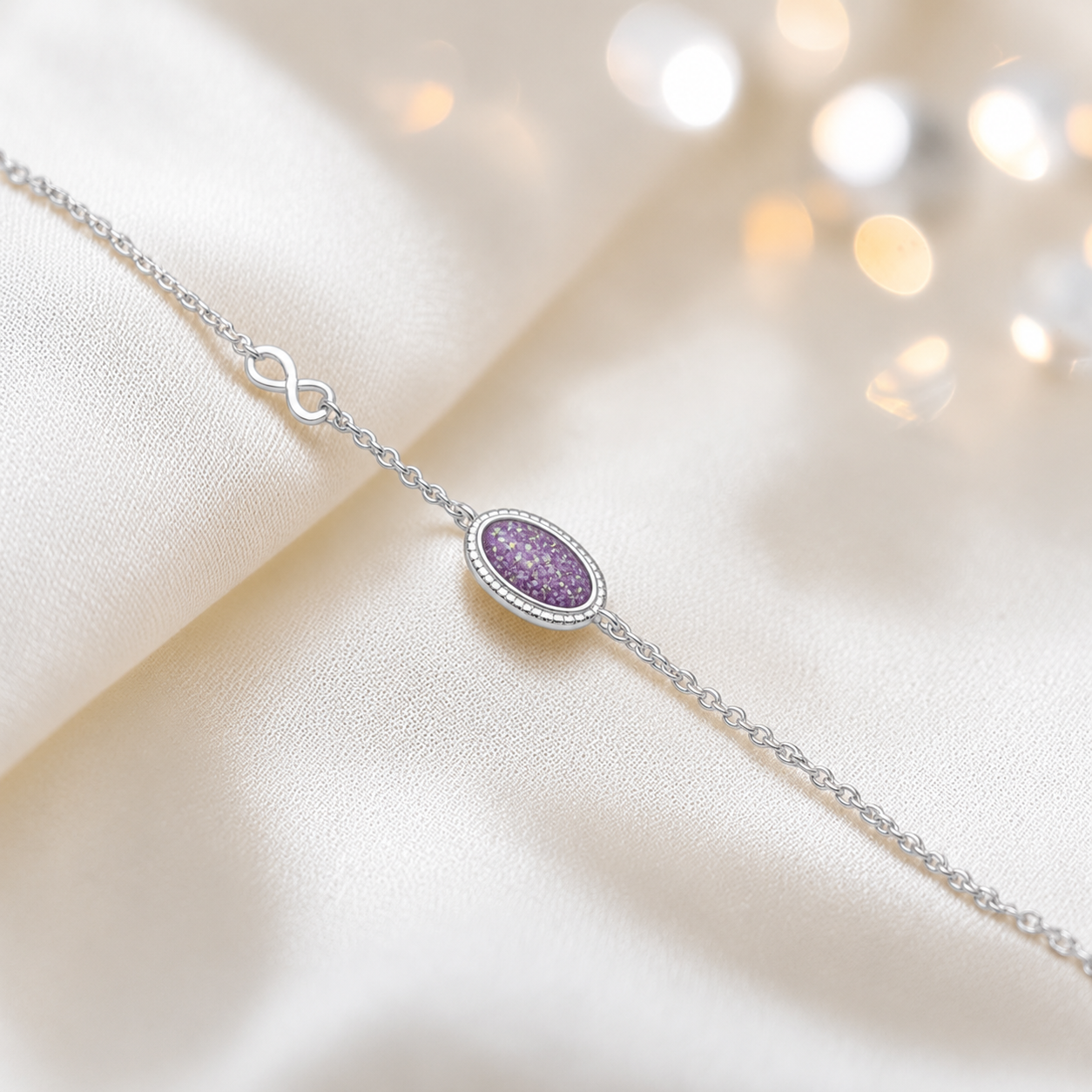 Lumen Bracelet — silver oval infinity ashes memorial bracelet in rose pink, handcrafted in Lancashire, UK - by Keepsake Memorial Jewellery
