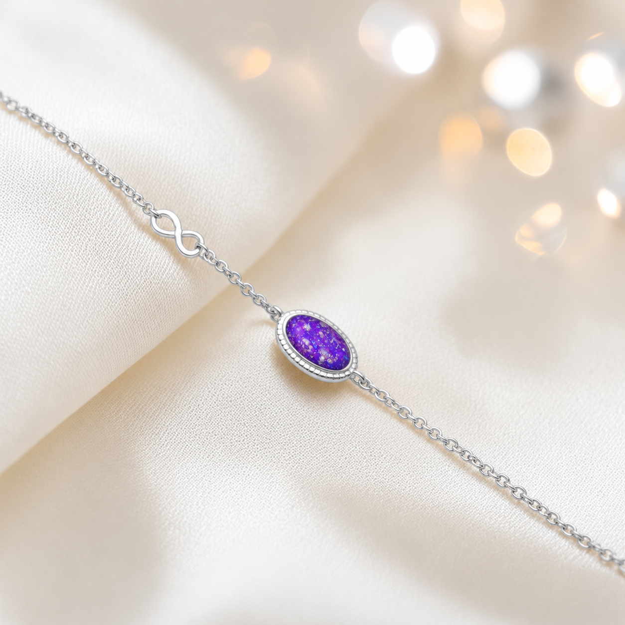 Lumen Bracelet — silver oval infinity ashes memorial bracelet in sleepy lavender, handcrafted in Lancashire, UK - by Keepsake Memorial Jewellery