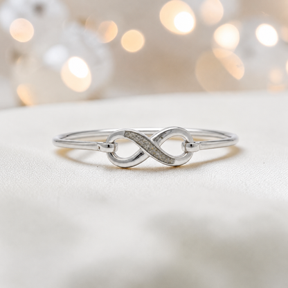 Lunara Bangle — silver infinity ashes memorial bangle in natural ash, handcrafted in Lancashire, UK - by Keepsake Memorial Jewellery