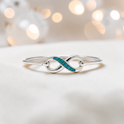 Lunara Bangle — silver infinity ashes memorial bangle in teal mist, handcrafted in Lancashire, UK - by Keepsake Memorial Jewellery