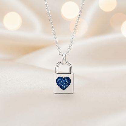 Mara sterling silver heart padlock pendant in sapphire glow, handcrafted in Lancashire UK