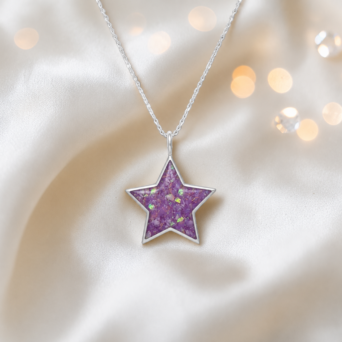 Merak sterling silver star memorial pendant in rose pink, handcrafted in Lancashire, UK
