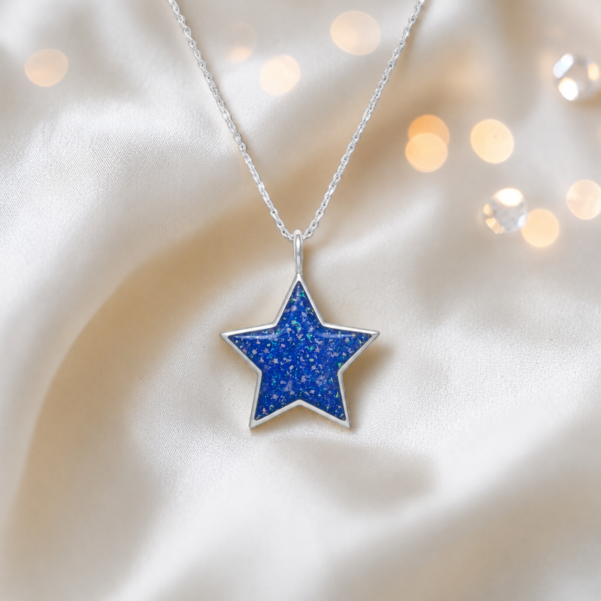 Merak sterling silver star memorial pendant in royal blue, handcrafted in Lancashire, UK