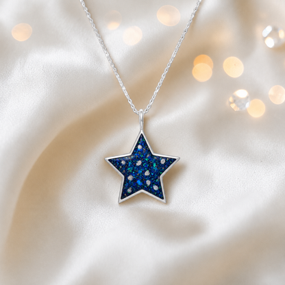 Merak sterling silver star memorial pendant in sapphire glow, handcrafted in Lancashire, UK