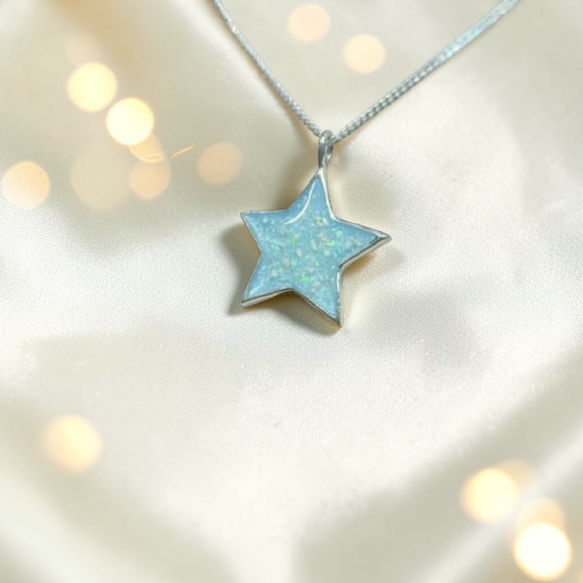 Merak silver star keepsake pendant, handcrafted in Lancashire UK