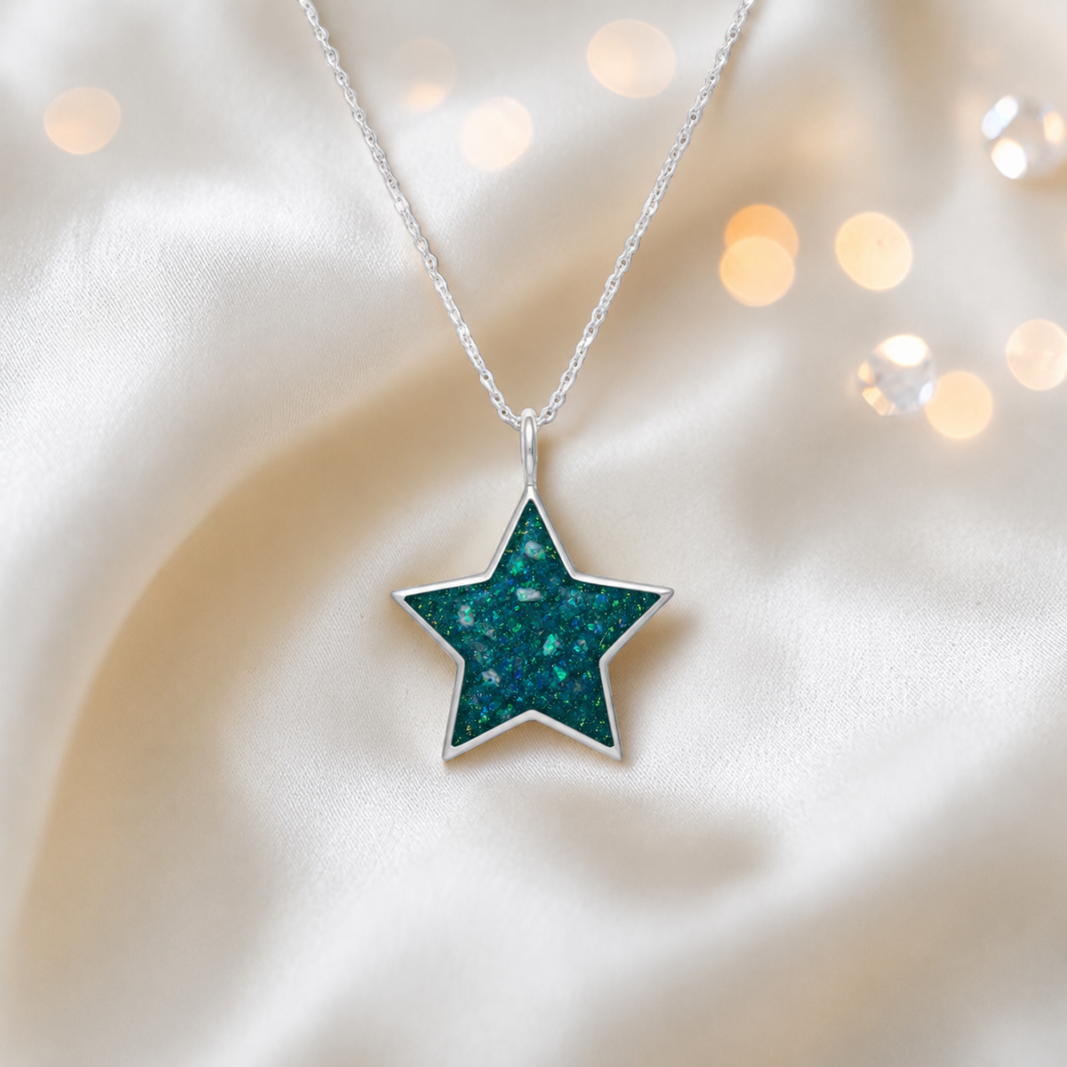 Merak sterling silver star memorial pendant in teal mist, handcrafted in Lancashire, UK