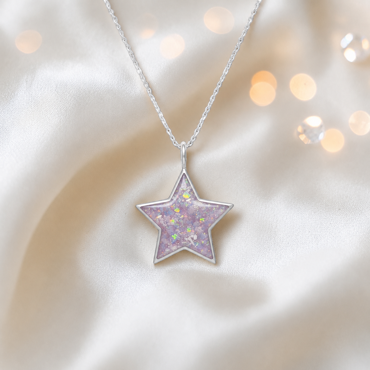 Merak sterling silver star memorial pendant in unicorn purple, handcrafted in Lancashire, UK