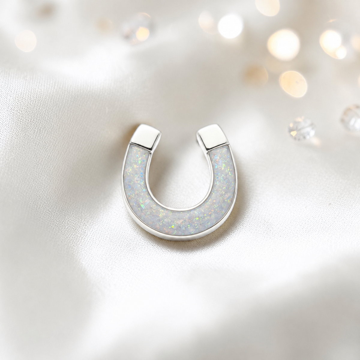 Midnight Stock Pin — silver horseshoe ashes memorial stock pin, in white snow, handcrafted in Lancashire, UK - by Keepsake Memorial Jewellery