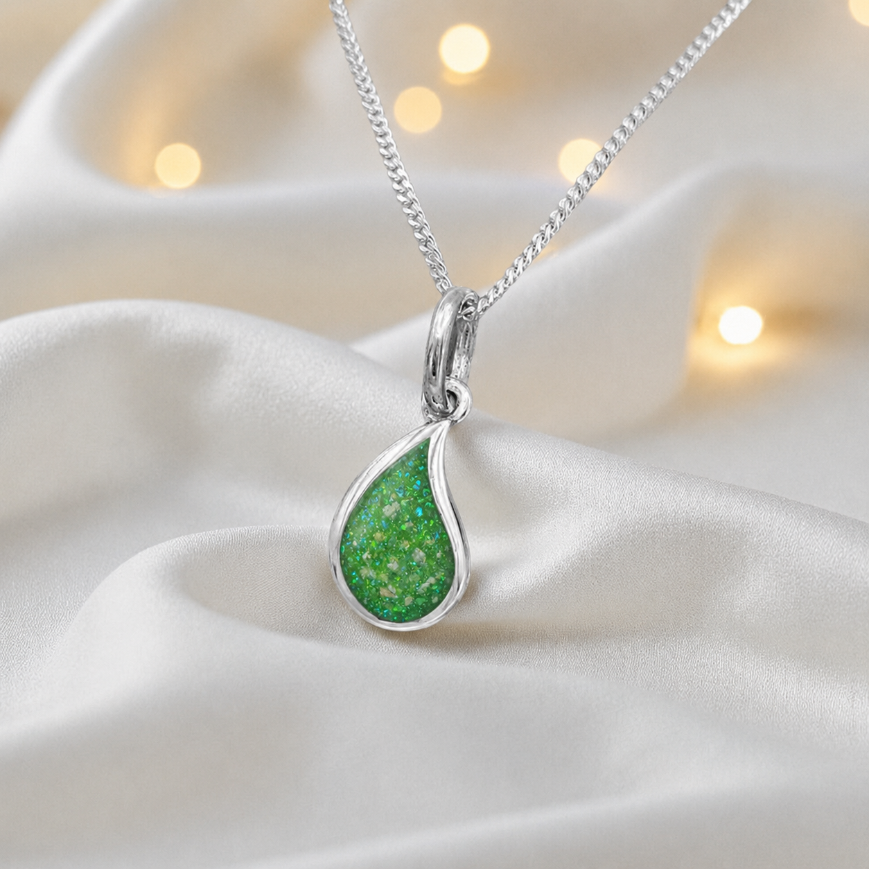 Milky teardrop memorial ashes pendant in fruit green, handcrafted in Lancashire UK - by Keepsake Memorial Jewellery