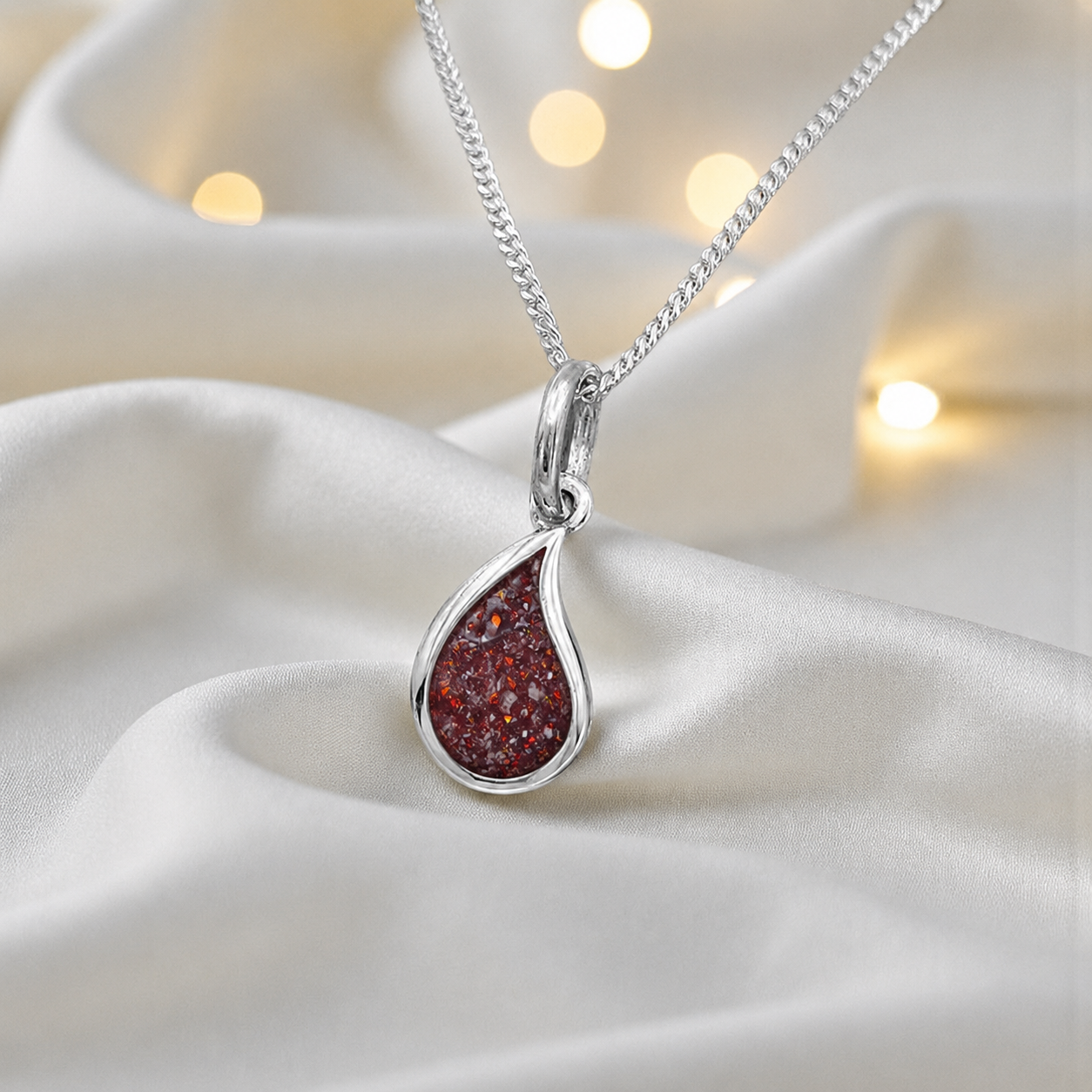 Milky teardrop memorial ashes pendant in ruby red, handcrafted in Lancashire UK - by Keepsake Memorial Jewellery