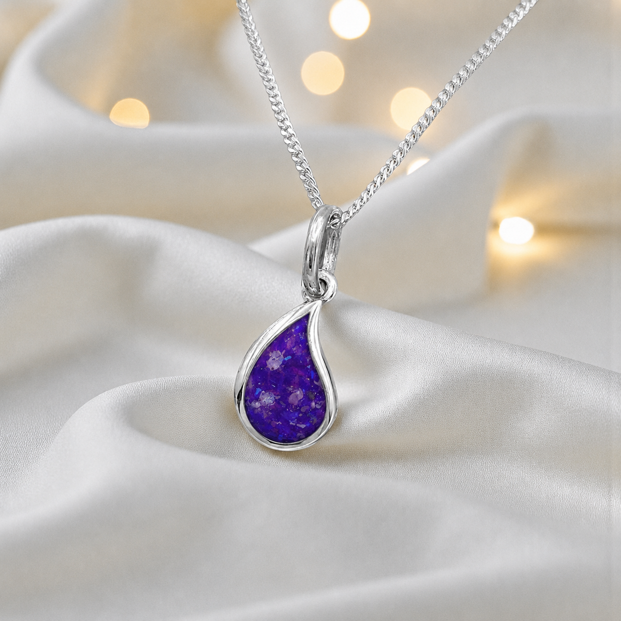 Milky teardrop memorial ashes pendant in sleepy lavender, handcrafted in Lancashire UK - by Keepsake Memorial Jewellery
