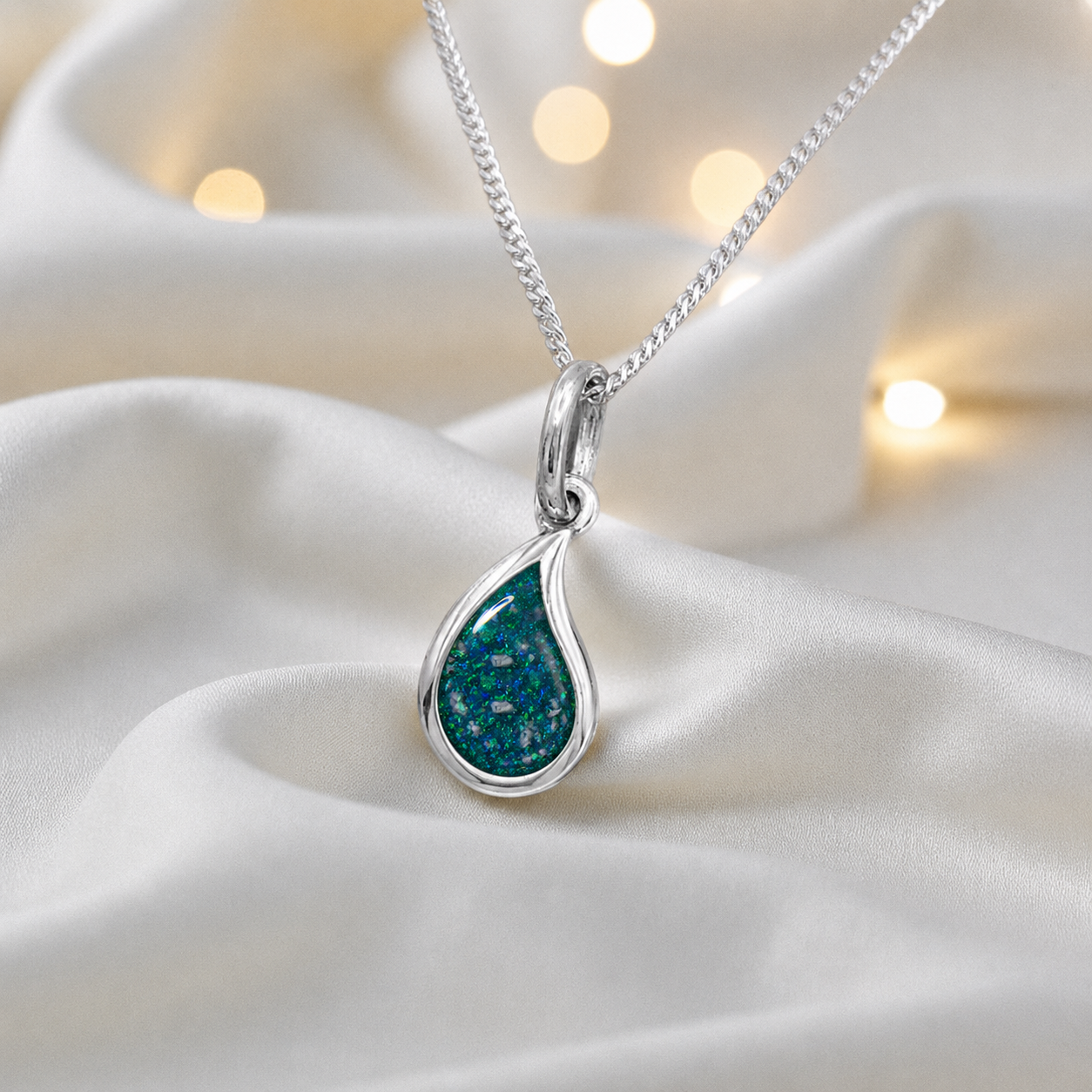 Milky teardrop memorial ashes pendant in teal mist, handcrafted in Lancashire UK - by Keepsake Memorial Jewellery