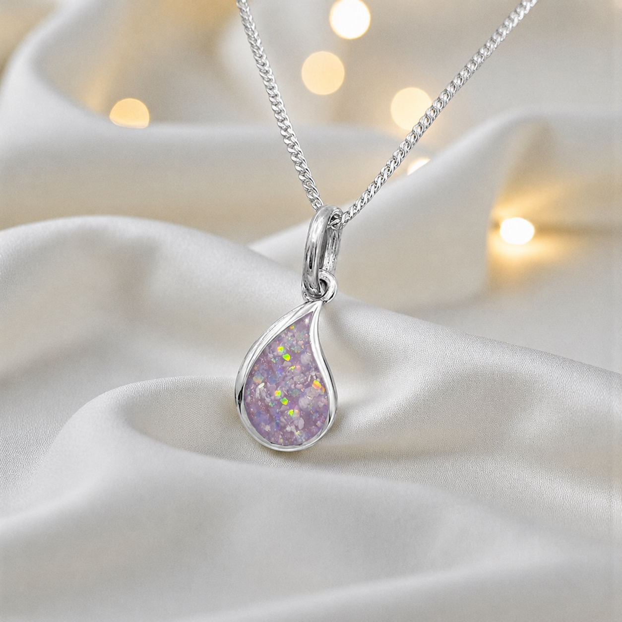 Milky teardrop memorial ashes pendant in unicorn purple, handcrafted in Lancashire UK - by Keepsake Memorial Jewellery