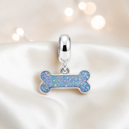 Milo silver dog bone ashes charm, in baby blue, handcrafted in Lancashire UK - by Keepsake Memorial Jewellery 