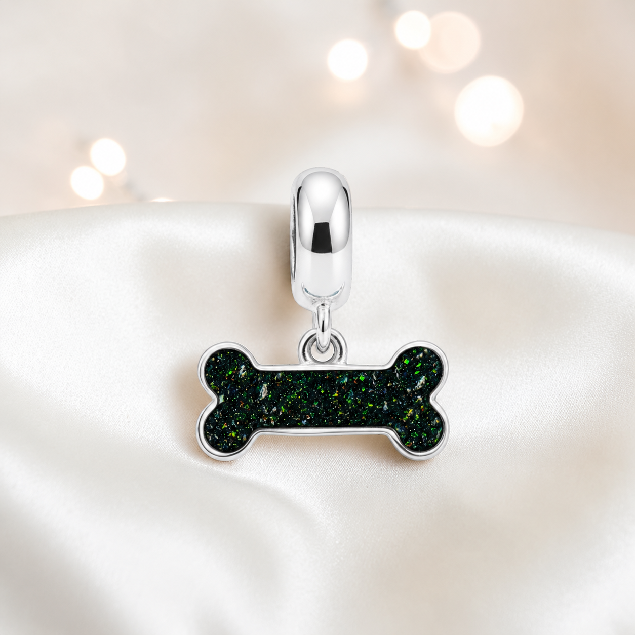 Milo silver dog bone ashes charm, in black flame, handcrafted in Lancashire UK - by Keepsake Memorial Jewellery 