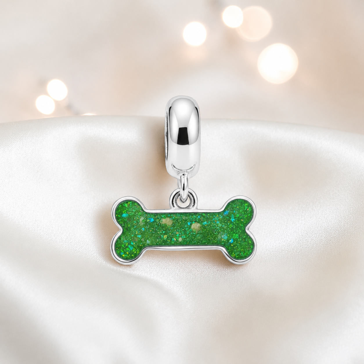 Milo silver dog bone ashes charm, in fruit green, handcrafted in Lancashire UK - by Keepsake Memorial Jewellery 
