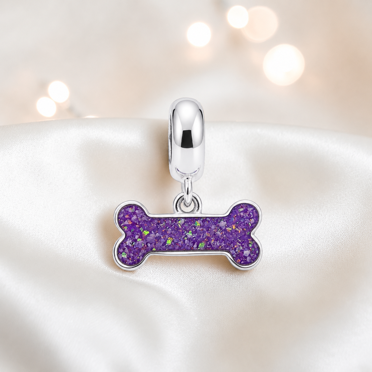 Milo silver dog bone ashes charm, in rose pink, handcrafted in Lancashire UK - by Keepsake Memorial Jewellery 