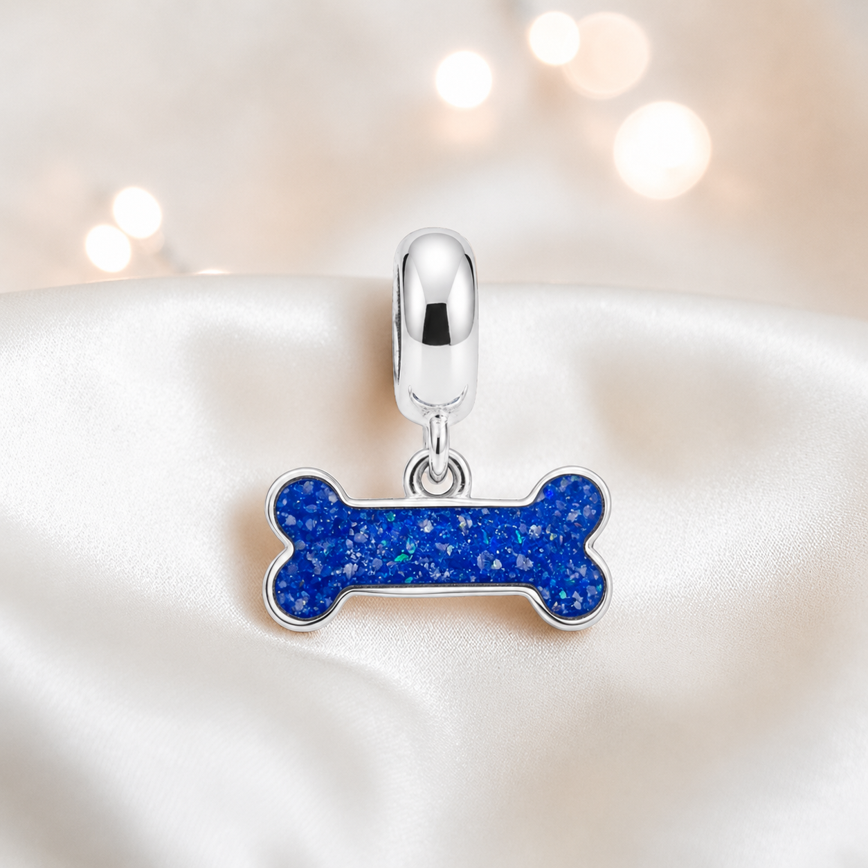 Milo silver dog bone ashes charm,  in royal blue, handcrafted in Lancashire UK - by Keepsake Memorial Jewellery 