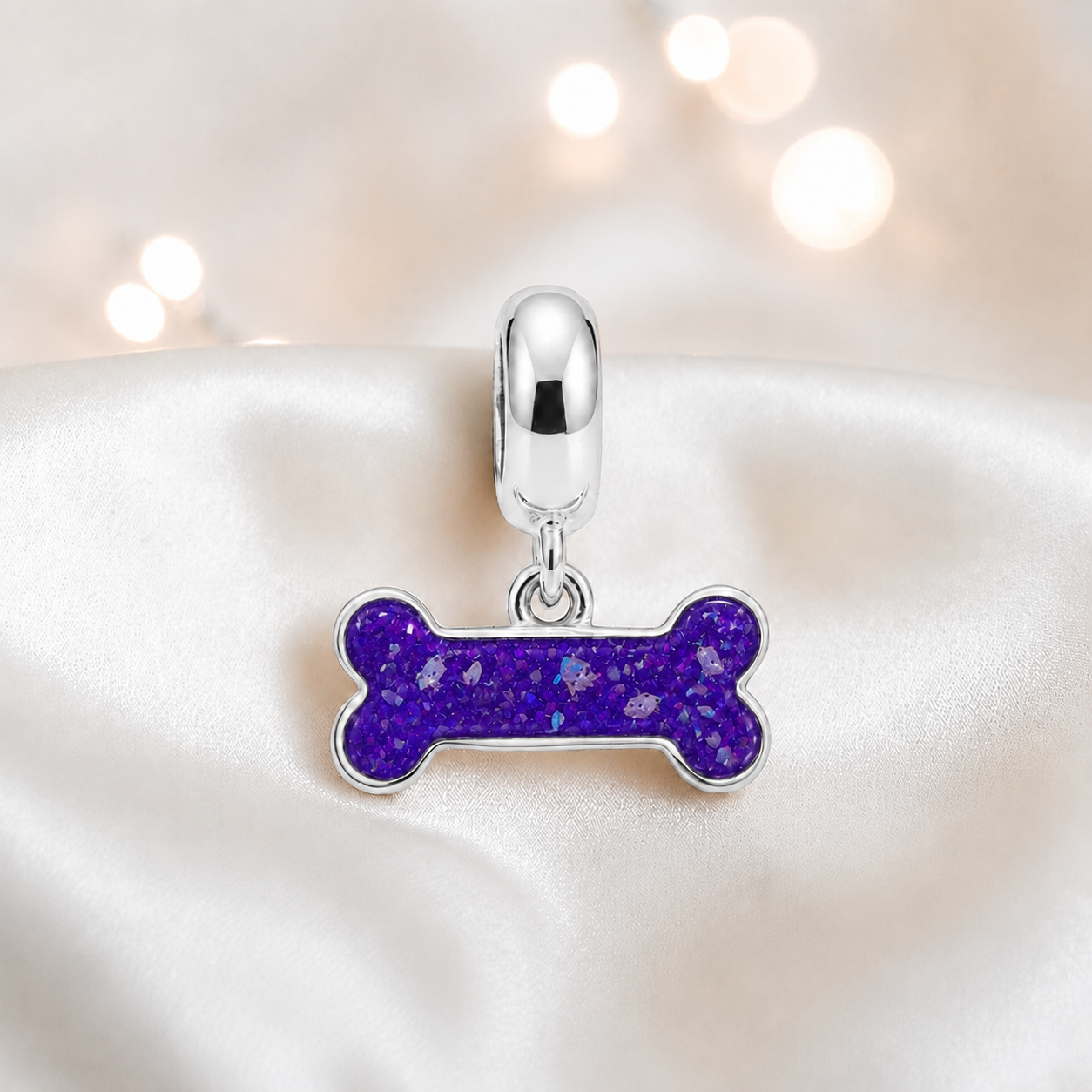 Milo silver dog bone ashes charm, in sleepy lavender, handcrafted in Lancashire UK - by Keepsake Memorial Jewellery 
