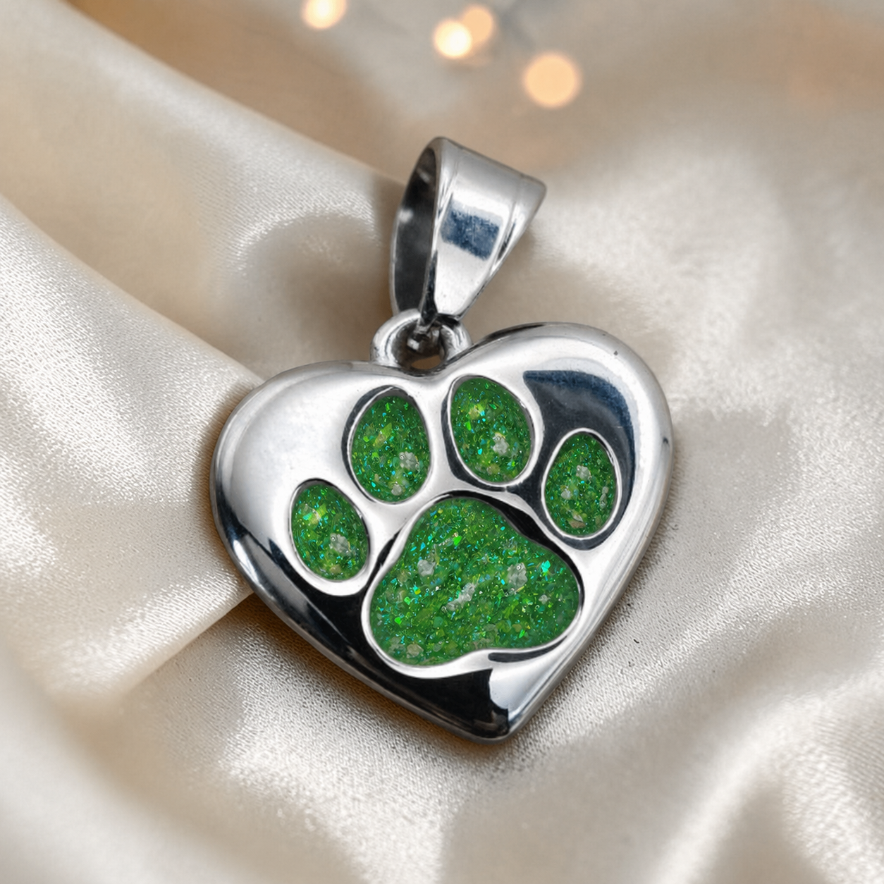 Milo paw keyring ashes charm in fruit green, handcrafted in Lancashire UK - by Keepsake Memorial Jewellery