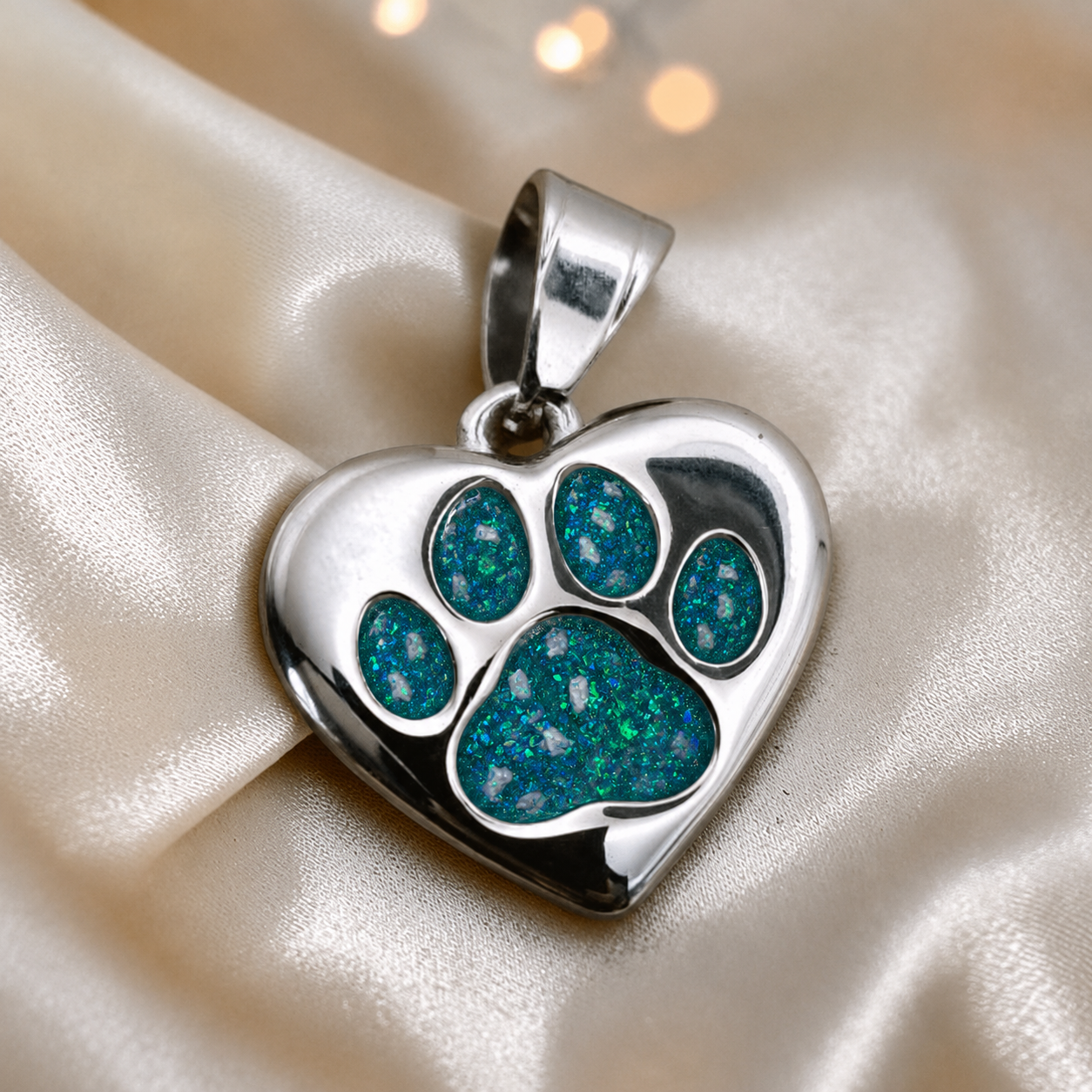 Milo paw keyring ashes charm in teal mist, handcrafted in Lancashire UK - by Keepsake Memorial Jewellery
