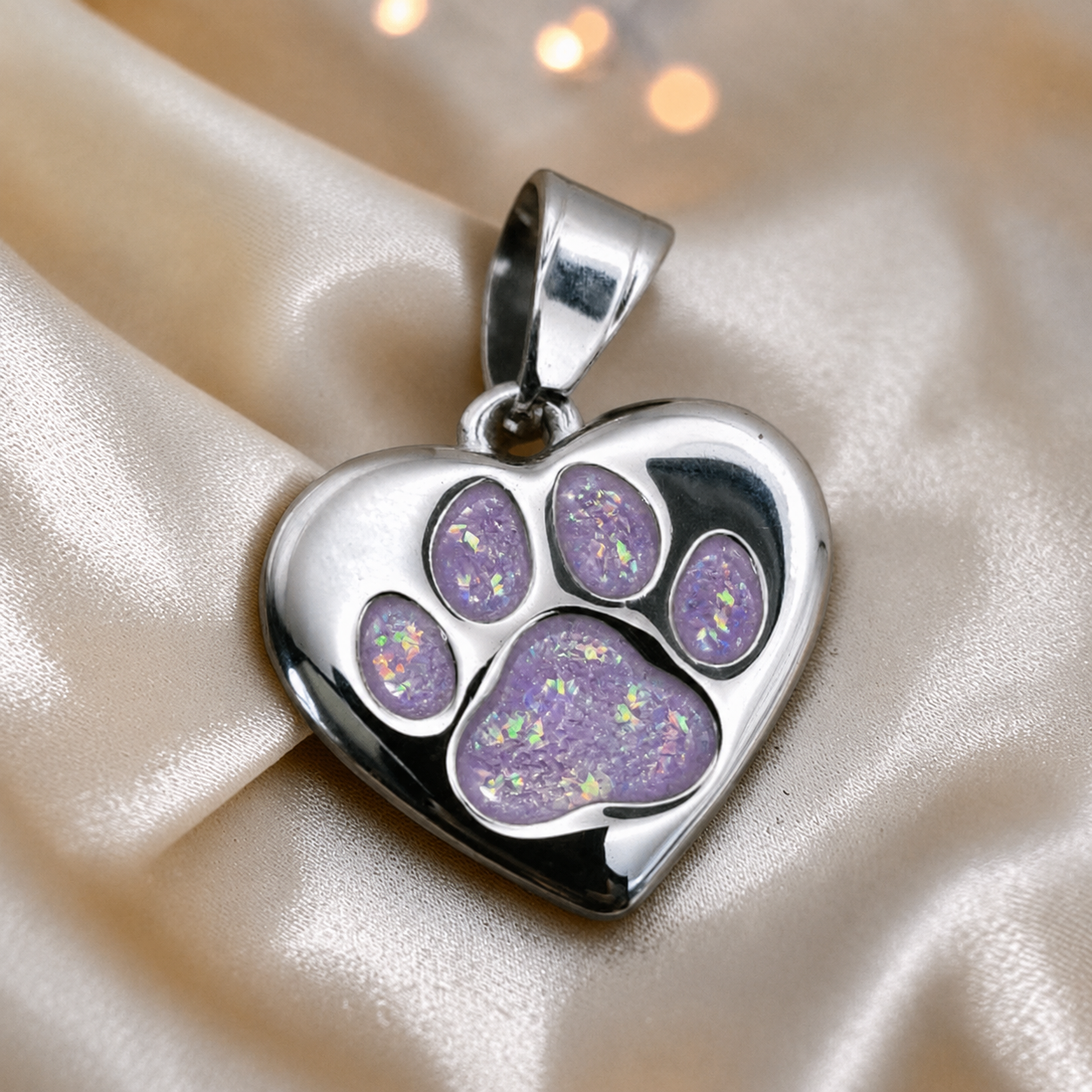 Milo paw keyring ashes charm in unicorn purple, handcrafted in Lancashire UK - by Keepsake Memorial Jewellery