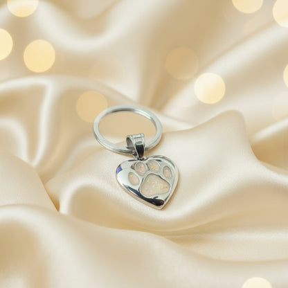 Milo paw keyring ashes charm in white snow, handcrafted in Lancashire UK - by Keepsake Memorial Jewellery