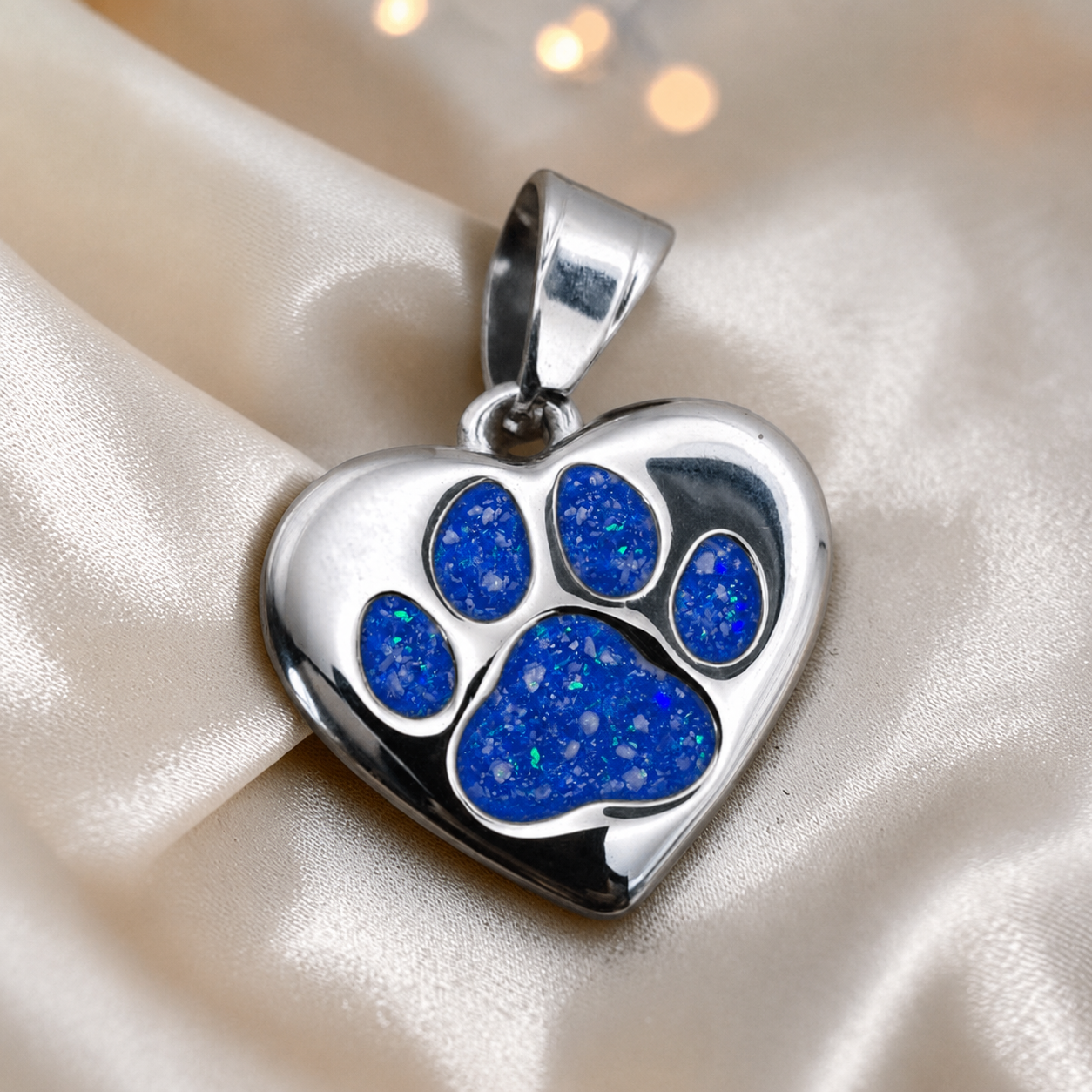 Milo paw keyring ashes charm, in royal blue, handcrafted in Lancashire UK - by Keepsake Memorial Jewellery
