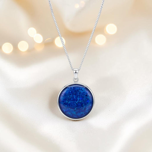 Mirfa large round silver memorial locket, handcrafted in Lancashire UK - by Keepsake Memorial Jewellery