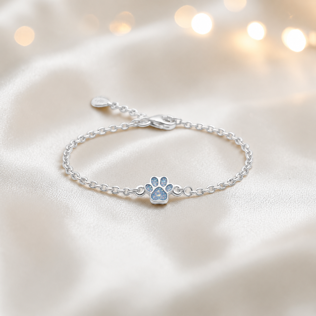 Molly paw ashes bracelet, in baby blue, handcrafted in Lancashire UK - by Keepsake Memorial Jewellery
