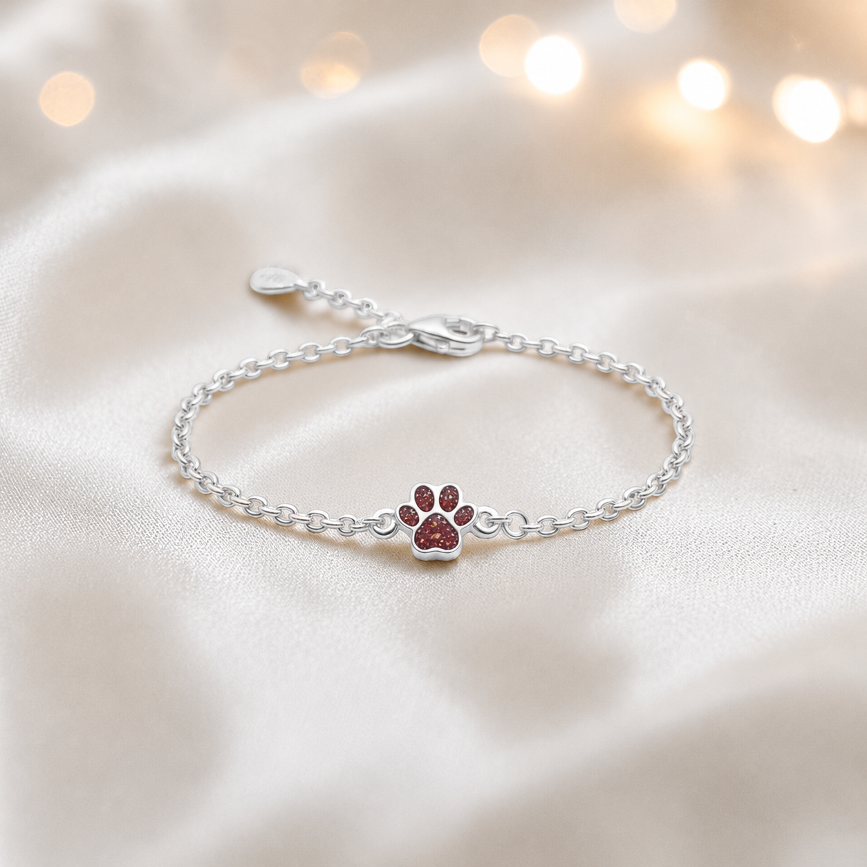 Molly paw ashes bracelet, in ruby red, handcrafted in Lancashire UK - by Keepsake Memorial Jewellery