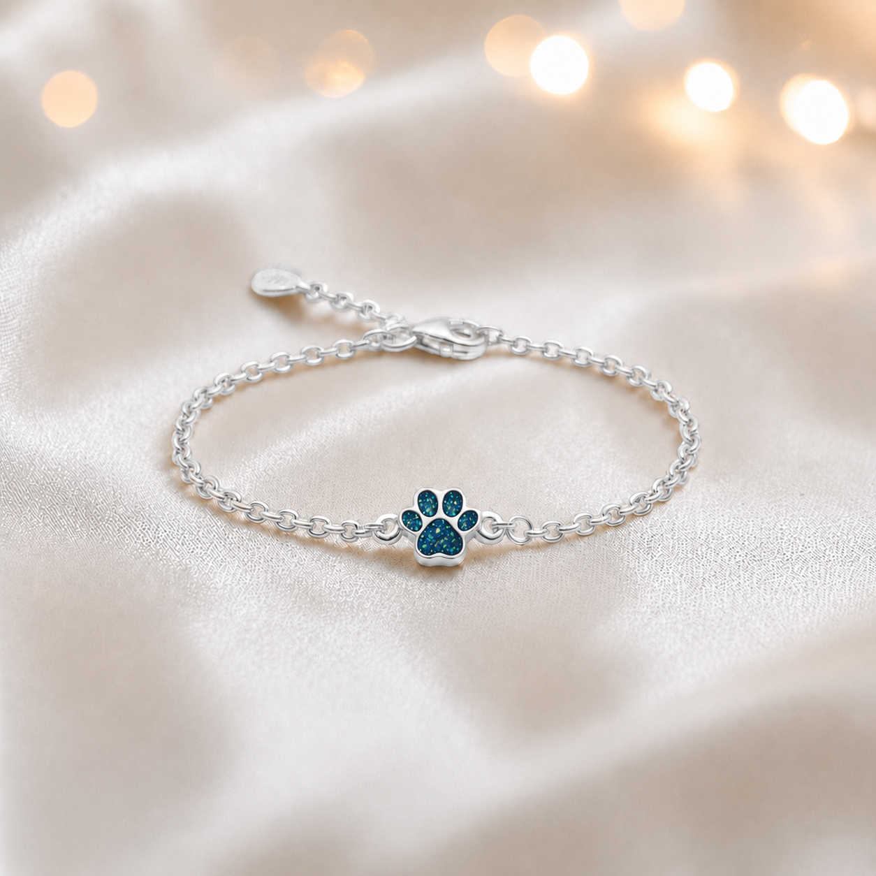 Molly paw ashes bracelet, in teal mist, handcrafted in Lancashire UK - by Keepsake Memorial Jewellery