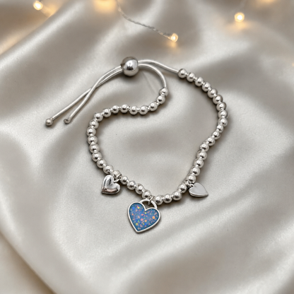 Nova memorial bracelet - three hearts beaded draw string bracelet, in baby blue, handcrafted in Lancashire UK - by Keepsake Memorial Jewellery