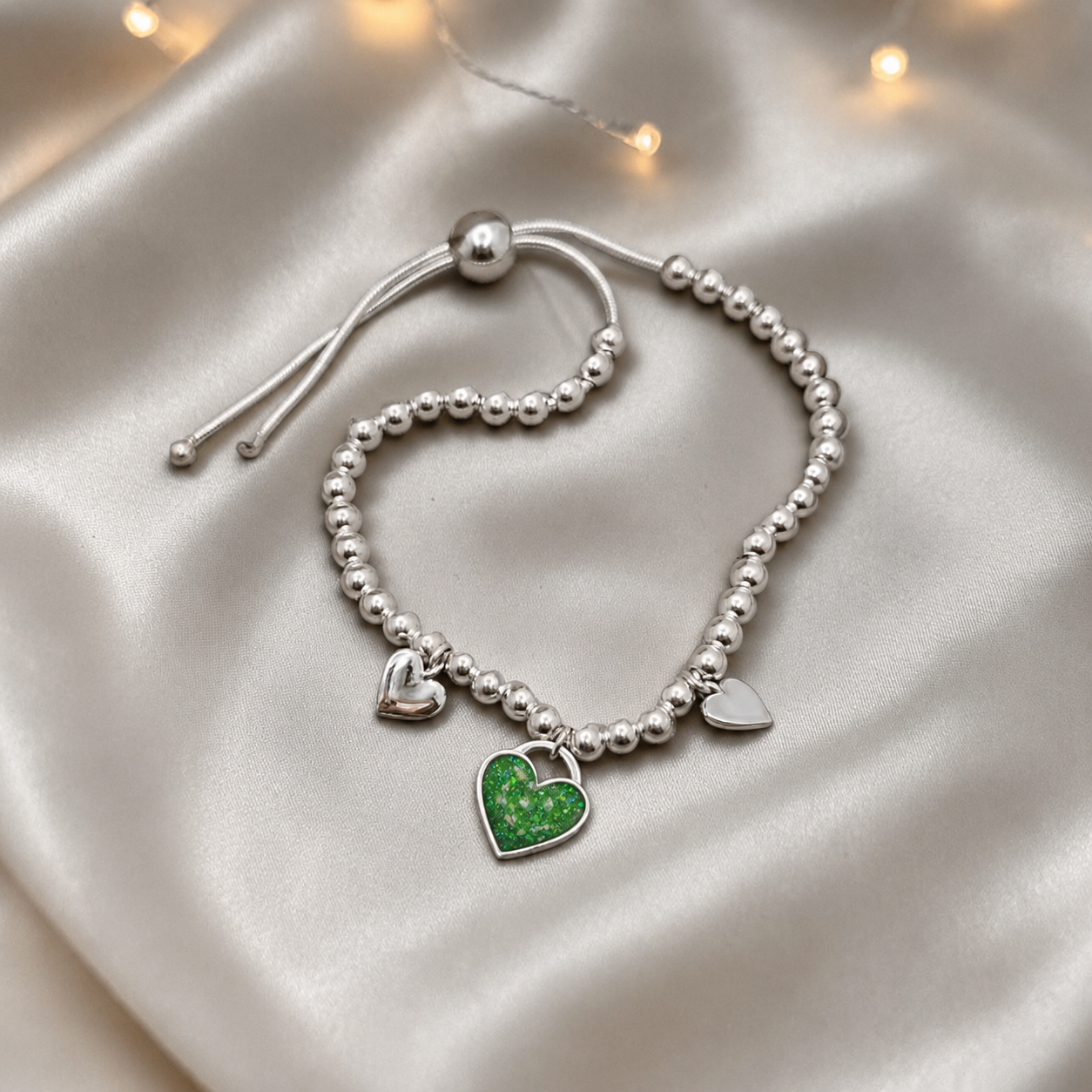 Nova memorial bracelet - three hearts beaded draw string bracelet, in fruit green, handcrafted in Lancashire UK - by Keepsake Memorial Jewellery